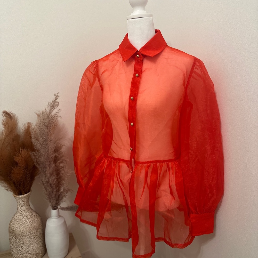 Sheer red blouse with gold buttons by Shopdandy